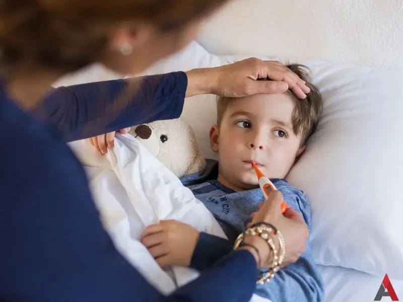 A child in bed with a thermometer. This image accompanies the page, "Yellow Fever Mosquito Identification Guide."